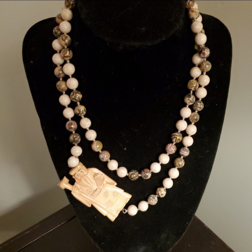 Genuine leopard jasper and antique carved bone